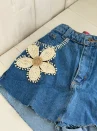 short saia jeans mari bordado com flor