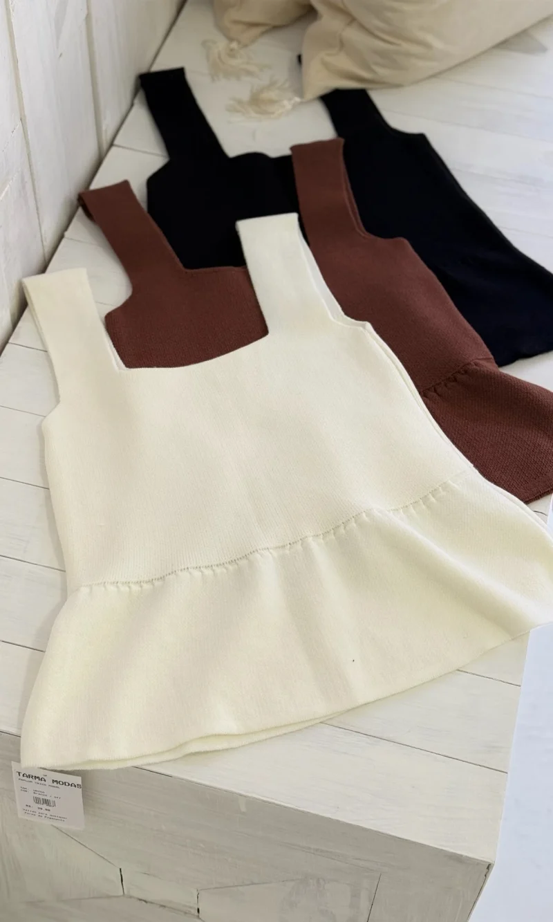 9915ab743d5f4653bc9751e51f2da3be.webp peplum trico modal